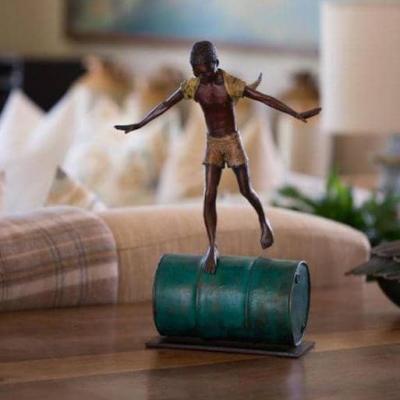 Boy on Drum by Louis Chanu